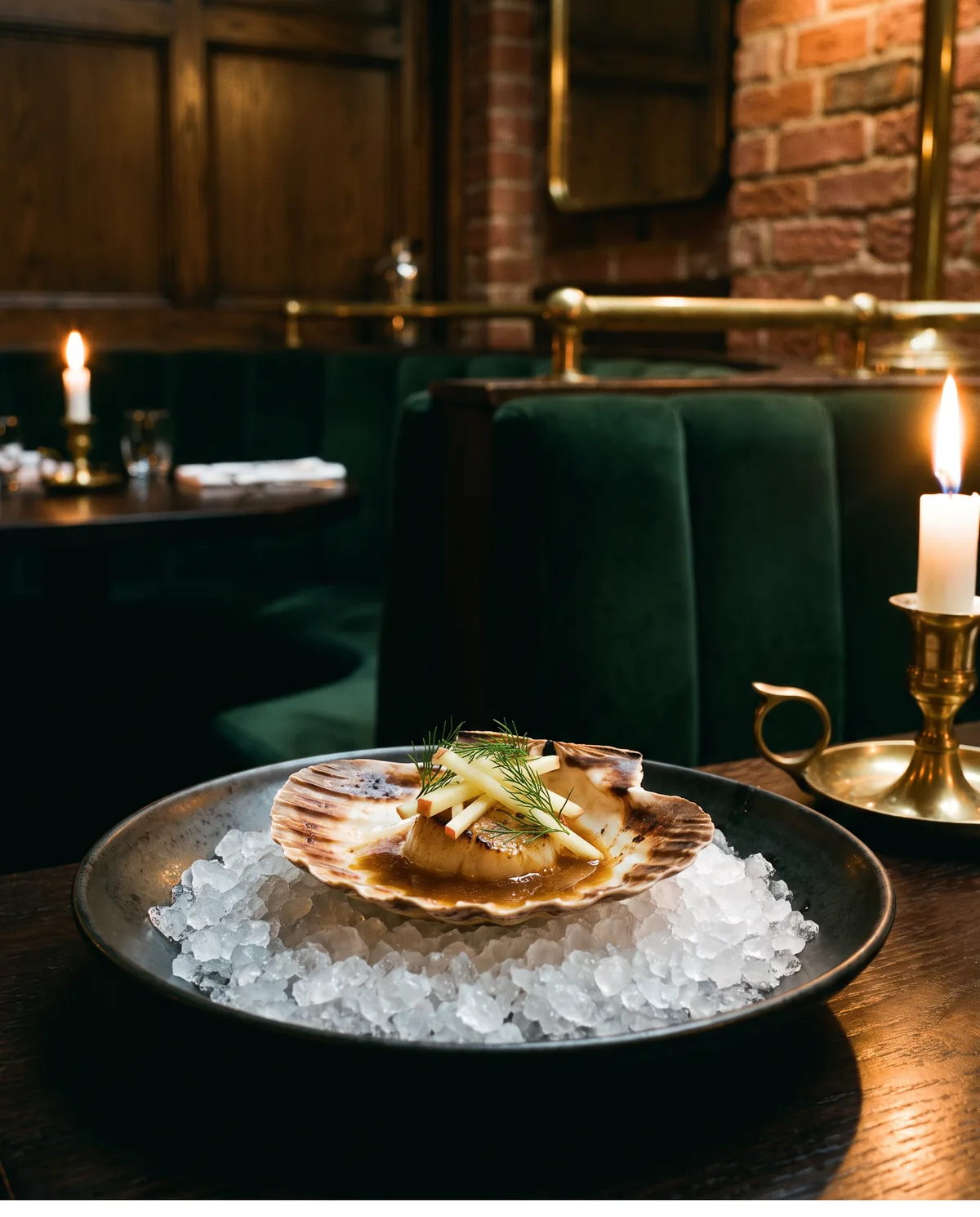 Scallop roasted in its shell over embers